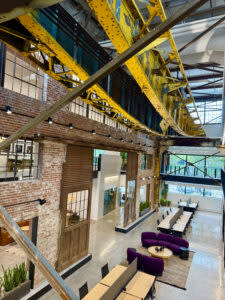 Shown up high is the gantry crane that used to move steel in the factory and now is part of the historic decor. (Cindy Gonzalez/Nebraska Examiner)