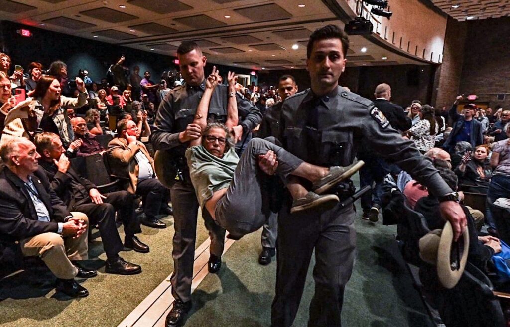 Video shows police carrying woman out of Mike Lawler town hall May 4 in Somers