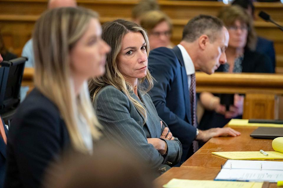 Karen Read sits with her legal team team in court Thursday, May 2, 2024, in Dedham, Mass. Read, 44, is accused of running into her Boston police officer boyfriend with her SUV in the middle of a nor'easter and leaving him for dead after a night of heavy drinking. (David McGlynn/New York Post via AP, Pool)