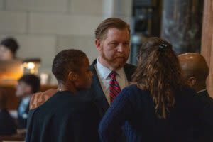 State Sen. John Cavanaugh of Omaha, center, meets with State Sens. Ashlei Spivey of Omaha, Danielle Conrad of Lincoln and Terrell McKinney of Omaha, from left. March 26, 2025. (Zach Wendling/Nebraska Examiner)