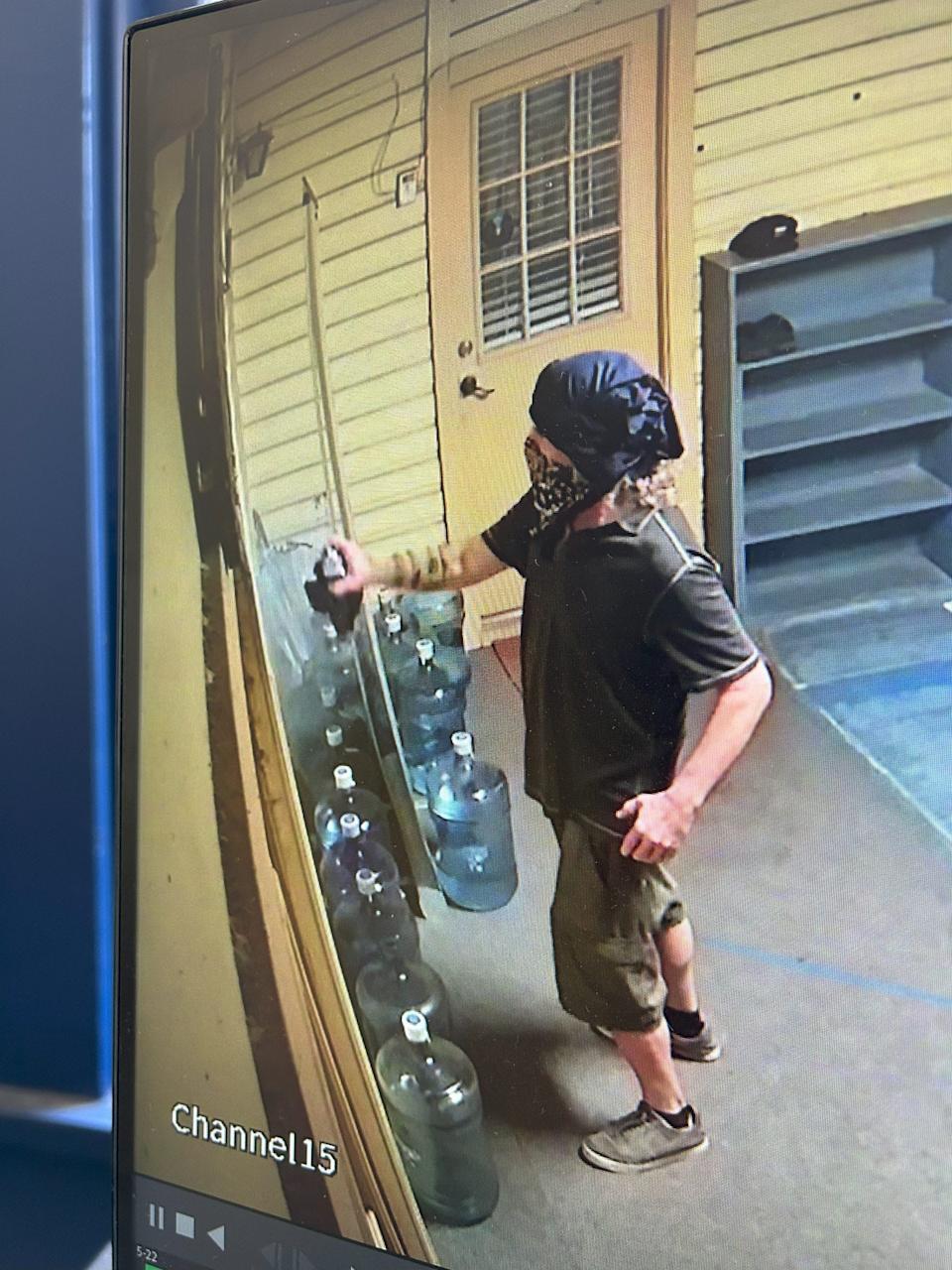 Security footage at Nueces Mosque captured the suspected vandal spray painting the Star of David on the building.