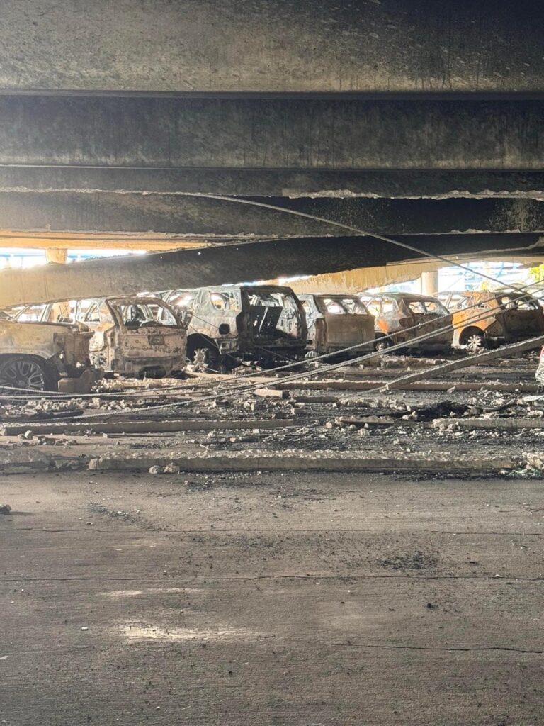 New photos show partial collapse, damaged cars at Jacksonville airport parking garage