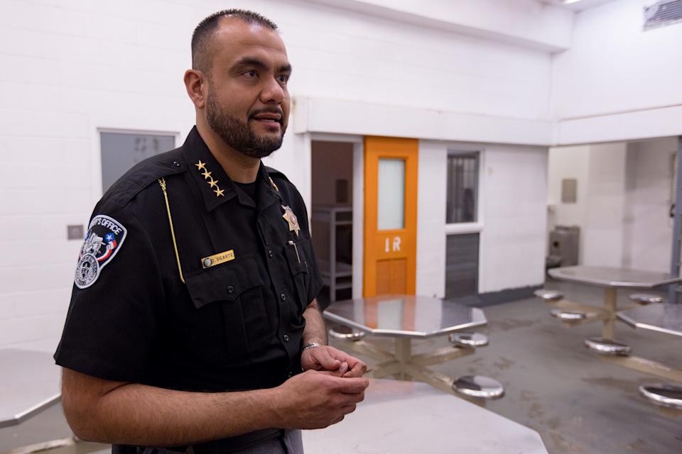 El Paso County Sheriff Oscar Ugarte talks in the general population cell block on Tuesday, April 2, 2025, at the El Paso County Downtown Detention Facility. These cell blocks do not have cameras but are subject to checks every 60 minutes. They house 20 inmates, with 10 beds on each side, and are designated for low-risk individuals.