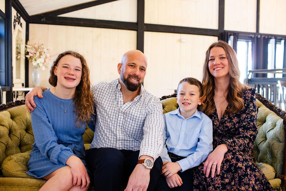 Brian Kreizinger, second from left, an art teacher at Taunton High School who died of cancer on April 17, 2025, is seen here with his wife Kate Thurston Kreizinger, right, and their children Audrey, left, and Oliver, second from right.