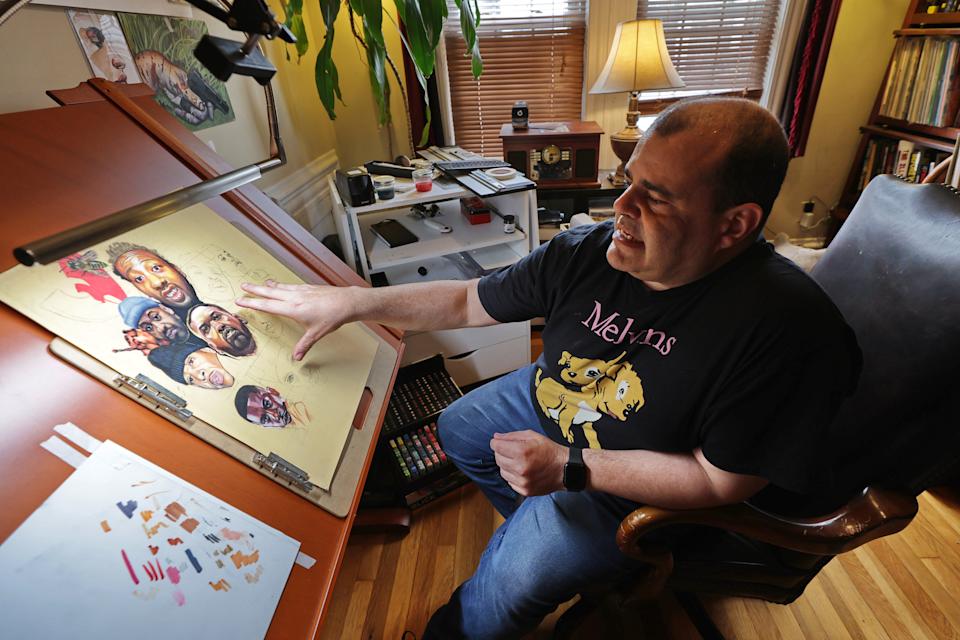 New Bedford Police Assistant Deputy Chief Scott Carola speaks about the latest piece he is working on at his home studio in New Bedford.