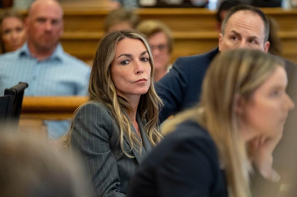 Karen Read sits with her legal team team in court, Thursday, May 2, 2024, in Dedham, Mass. Read, 44, is accused of running into her Boston police officer boyfriend with her SUV in the middle of a nor'easter and leaving him for dead after a night of heavy drinking. (David McGlynn/New York Post via AP, Pool)