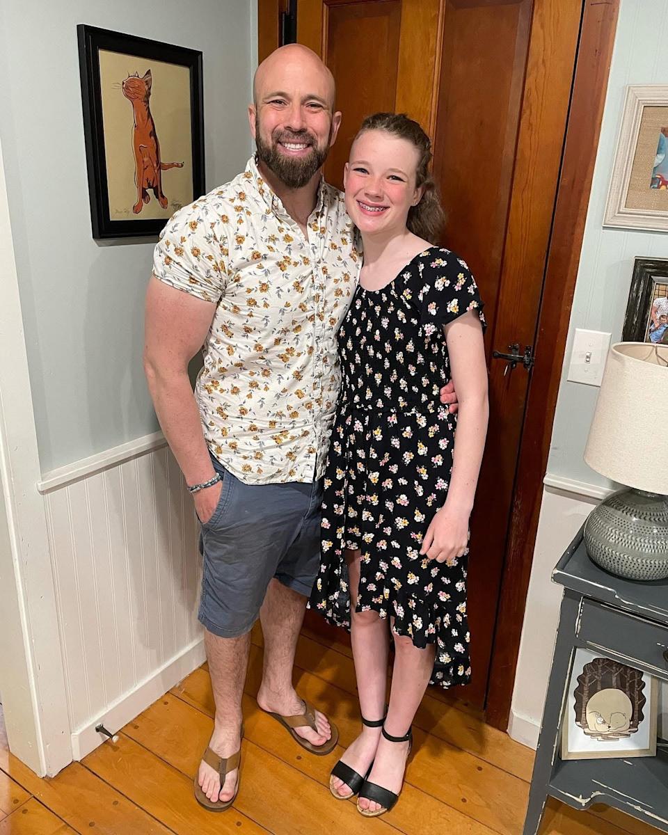 Brian Kreizinger, an art teacher at Taunton High School who died of cancer on April 17, 2025, is seen here with his daughter, Audrey.