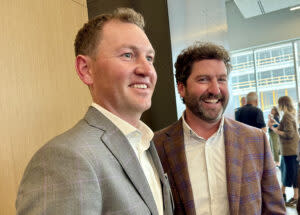 Dean Koelbel of Denver-based Koelbel and Co., left, and Jay Lund of GreenSlate Development, partnered in the Catalyst adaptive reuse project with UNMC as the public partner. (Cindy Gonzalez/Nebraska Examiner)