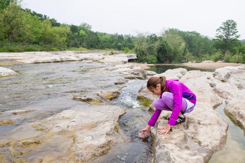 Who named Onion Creek south of Austin and why?