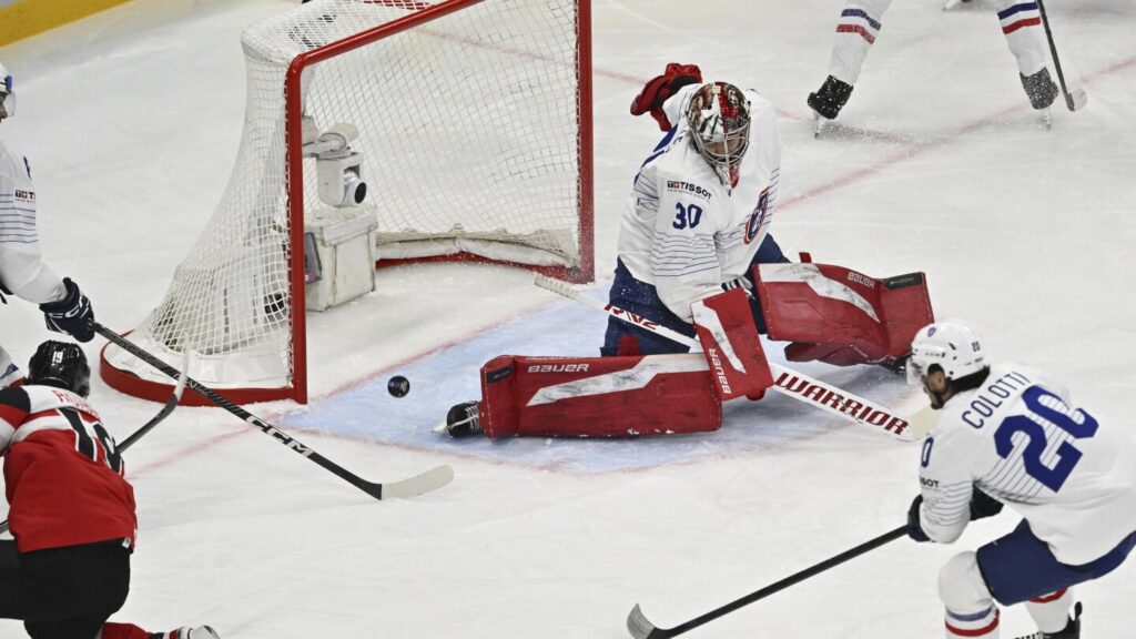 Sweden blanks newcomer Slovenia and Switzerland shuts out Norway at ice hockey worlds