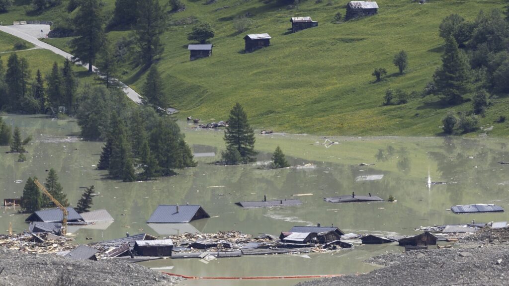 A river dammed by a huge Swiss landslide is flowing again. That’s a relief to authorities