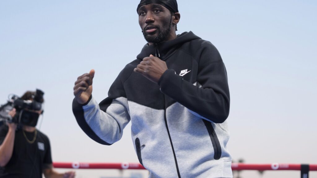 Boxing champ Terence Crawford tells Omaha graduates to work hard and keep fighting for success