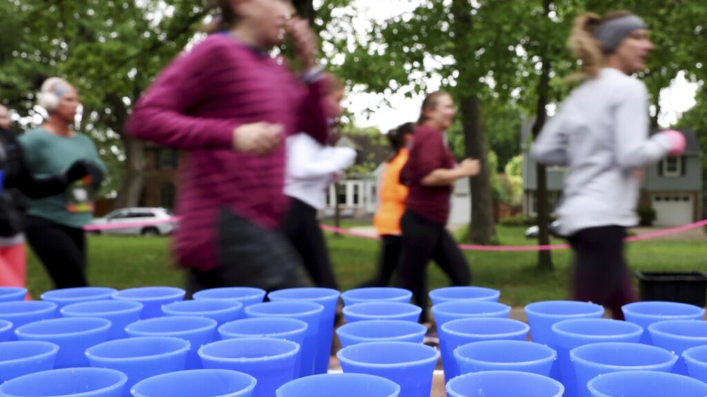 This runner was bothered by blizzard of disposable cups at races. She invented something better