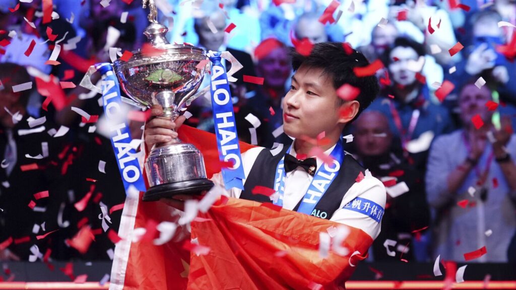 Zhao Xintong becomes Asia’s first world snooker champion after match-fixing ban