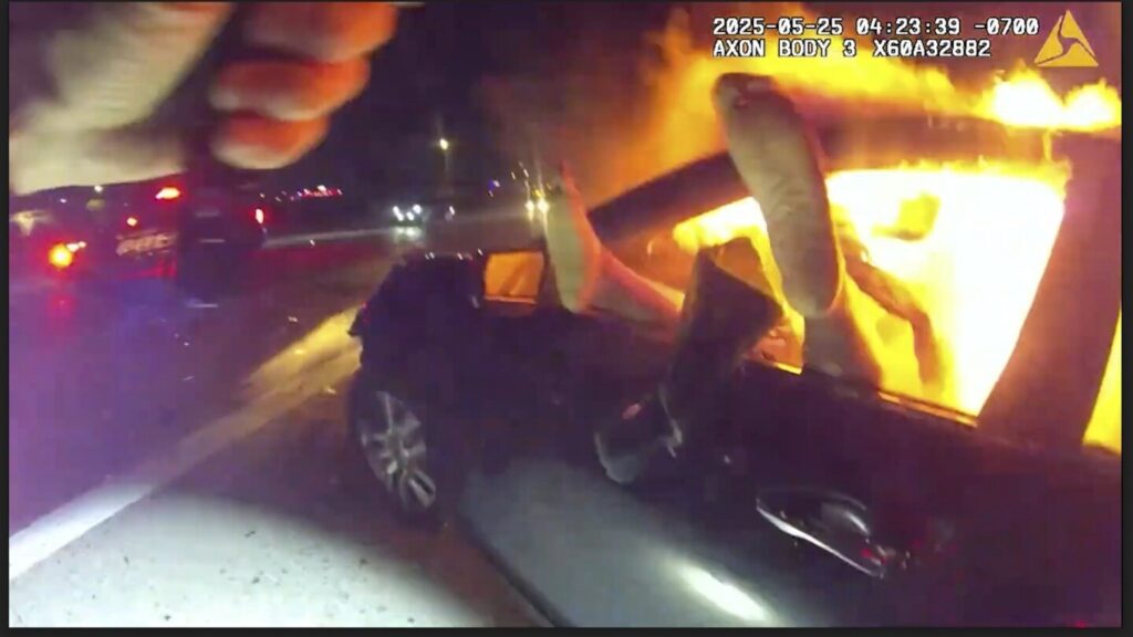 Phoenix area police officer rescues woman from burning car after interstate crash