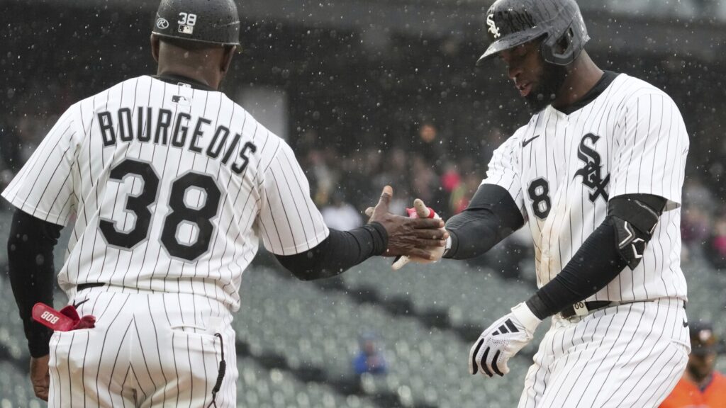 White Sox rally to beat Astros 5-4 in game shortened to 7 innings by rain