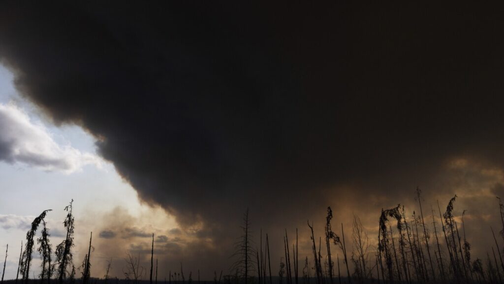 Wildfires burning across central Canada force additional evacuation orders and more shelters to open