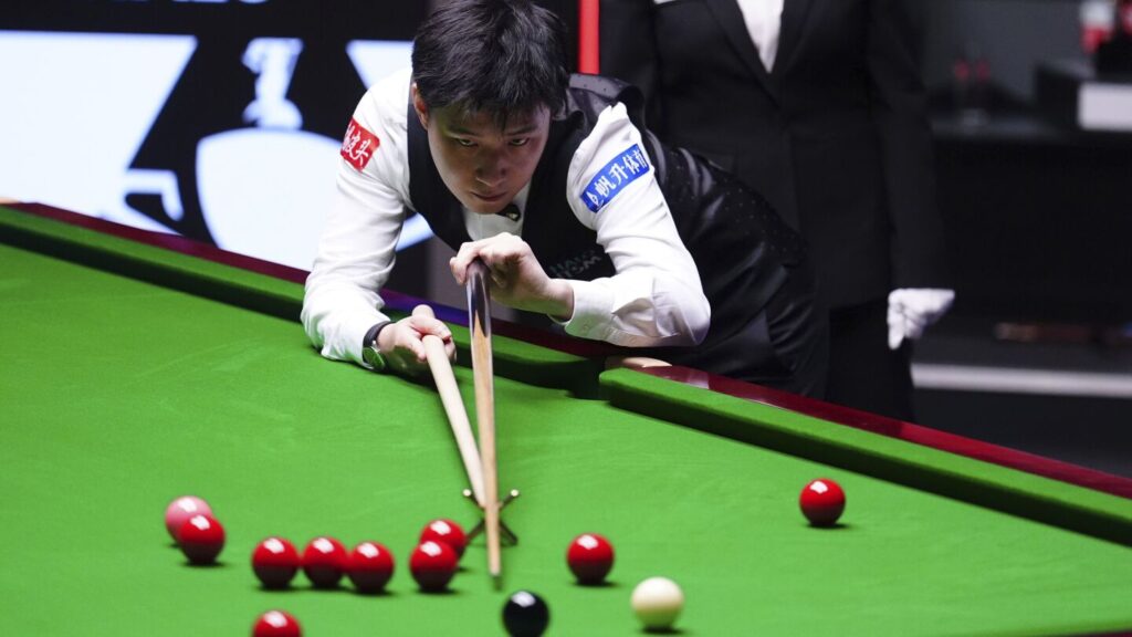 Zhao Xintong leads 11-6 in final of snooker worlds in bid to become first winner from China