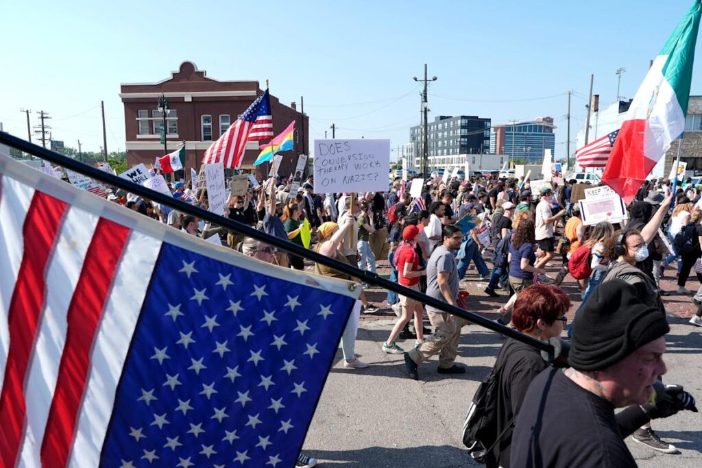 Thousands throughout Michigan peacefully protest Trump policies, military parade
