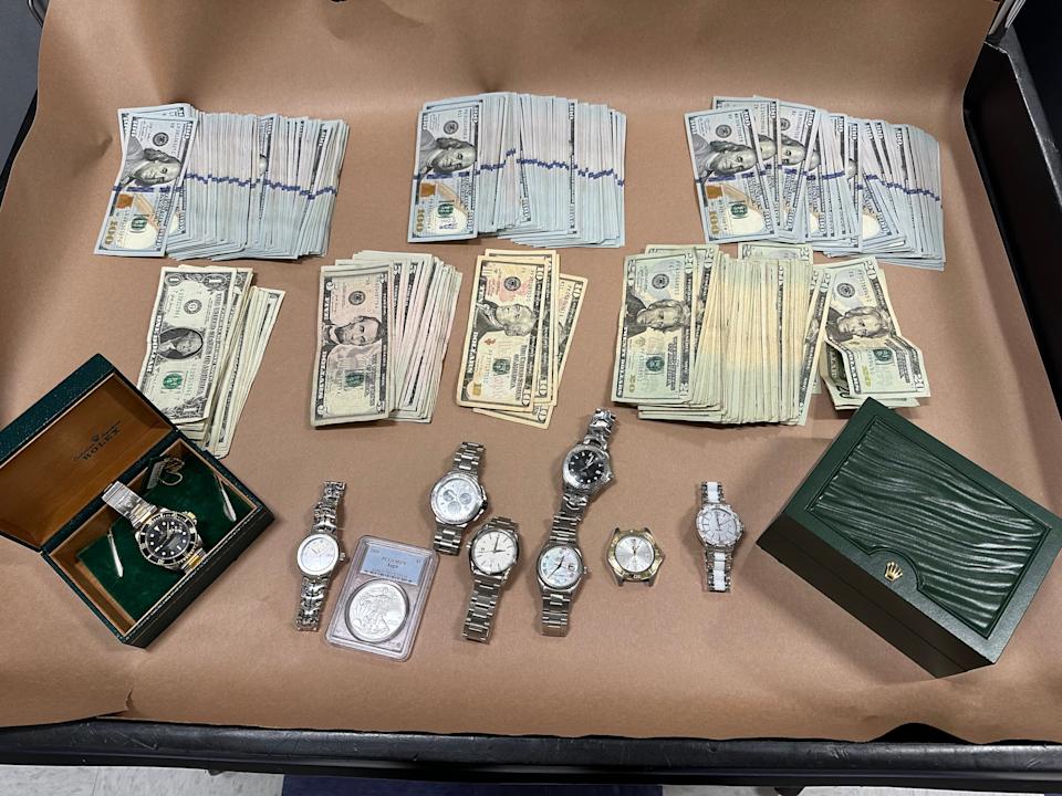 Watches and cash taken from the suspects in the May 25 burglary of 5 Star Jewelry & Watch Repair in Simi Valley.