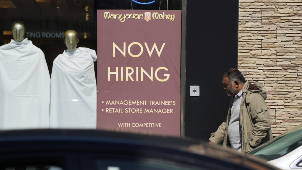 US unemployment claims dip | AP News