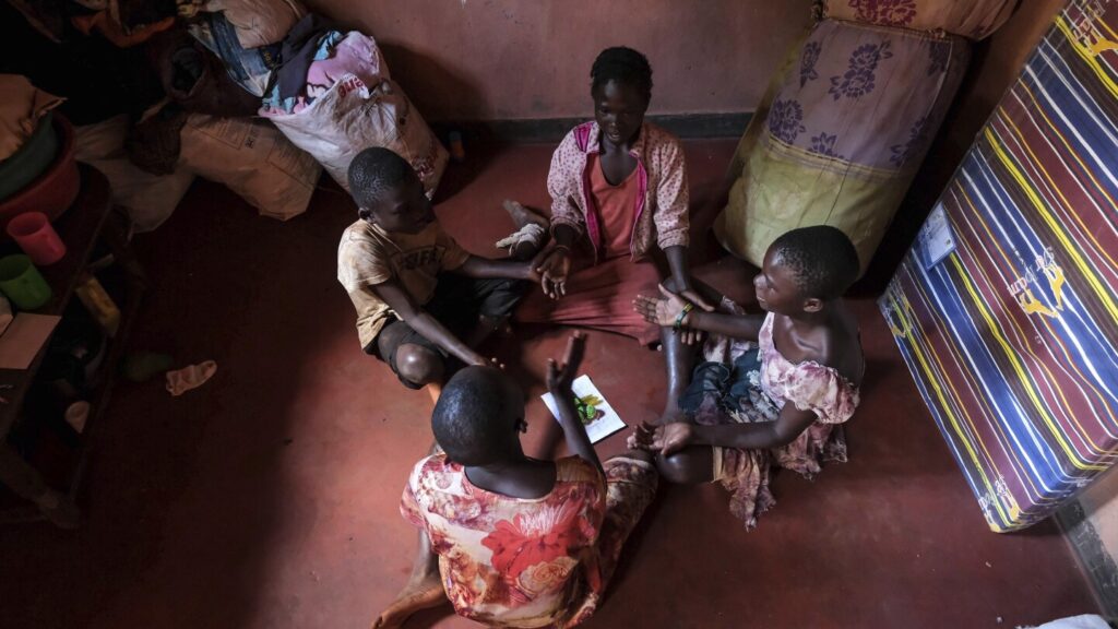 A clay-based floor is a healthier replacement for dirt in Uganda