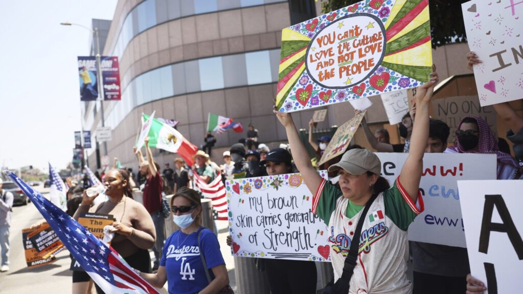 Protests against immigration raids prompt arrests, curfews and National Guard mobilization