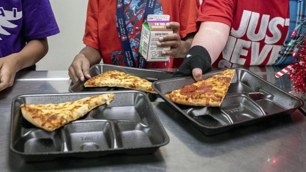 There’s a new push to put whole milk back in school meals. Here’s what you should know
