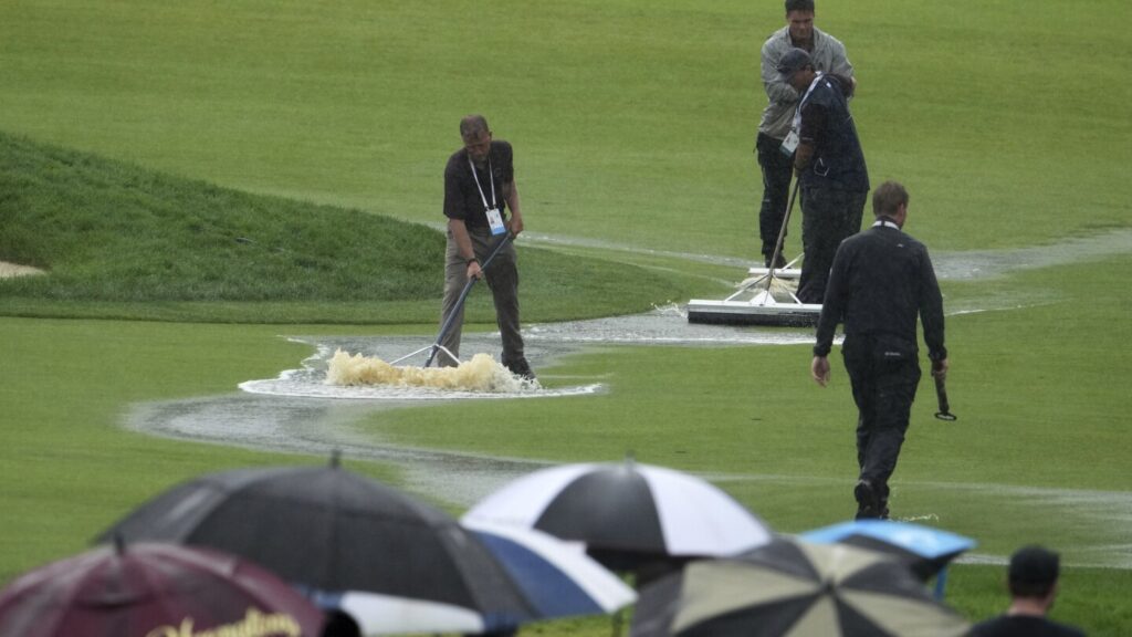 US Open a race against daylight on rain-soaked Oakmont