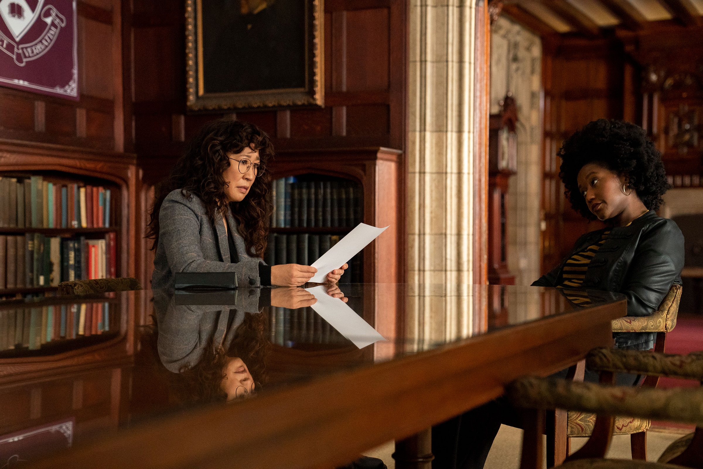 THE CHAIR (L to R) SANDRA OH as JI-YOON and NANA MENSAH as YAZ in episode 104 of THE CHAIR Cr. ELIZA MORSE/NETFLIX &copy; 2021
